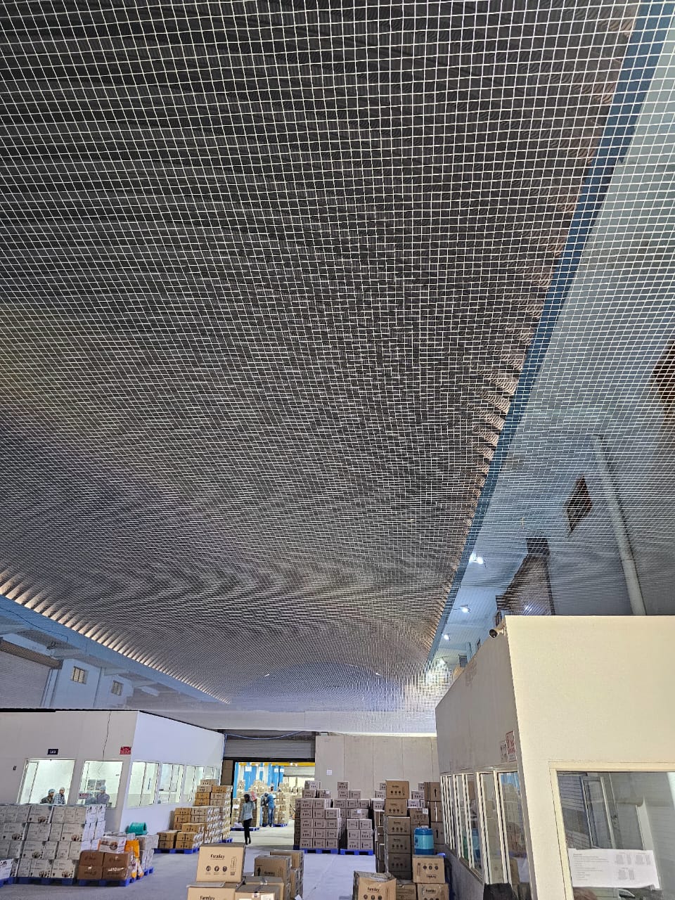 Close-up of warehouse ceiling bird net grid